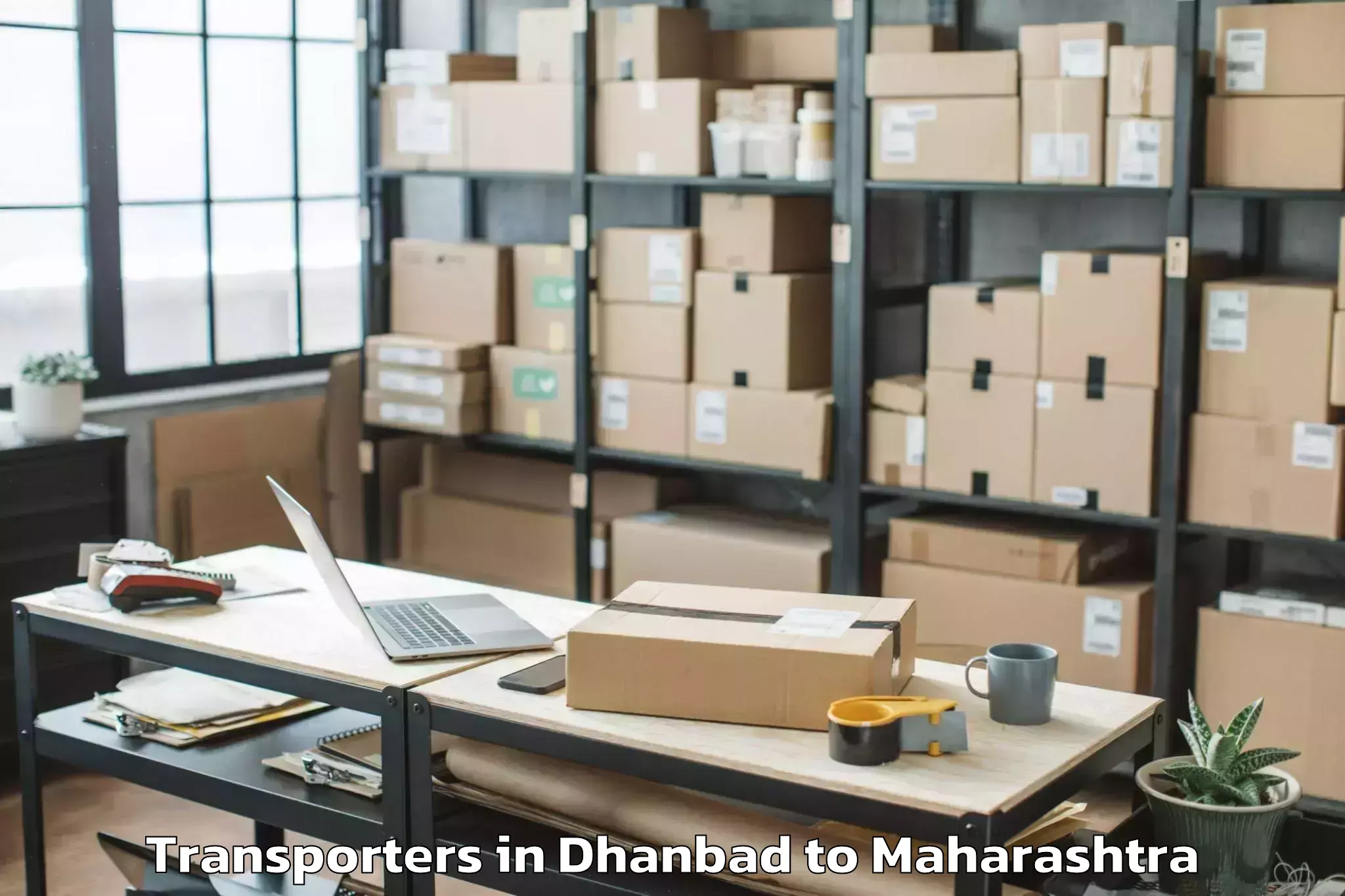 Book Dhanbad to Wadwani Transporters Online